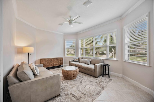 tiled living room with ceiling fan and ornamental molding