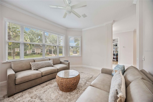 living room with ceiling fan and crown molding