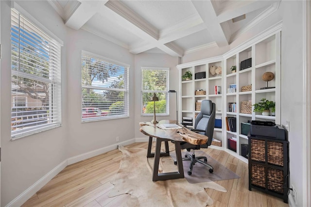 office area featuring beamed ceiling, crown molding, coffered ceiling, and light hardwood / wood-style floors