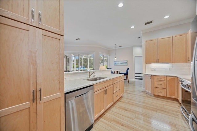 kitchen featuring appliances with stainless steel finishes, light brown cabinets, backsplash, ornamental molding, and sink