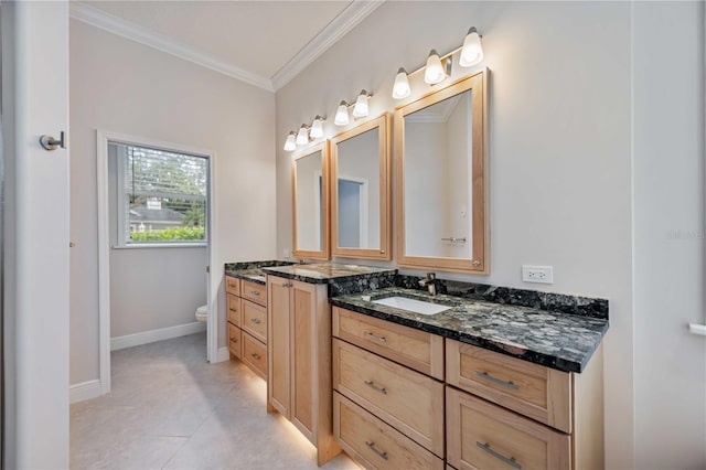 bathroom with toilet, ornamental molding, tile patterned floors, and vanity