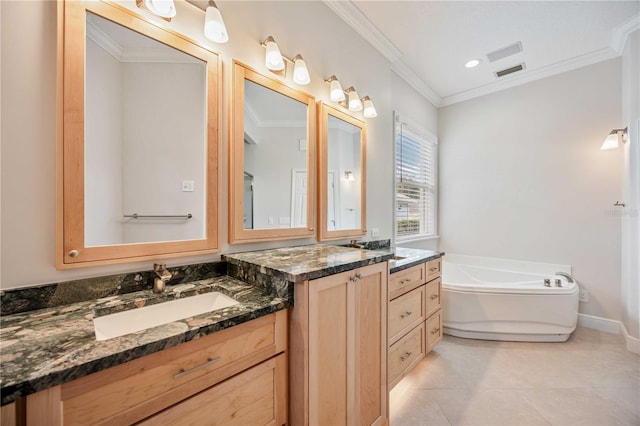 bathroom with a bathing tub, crown molding, tile patterned floors, and vanity