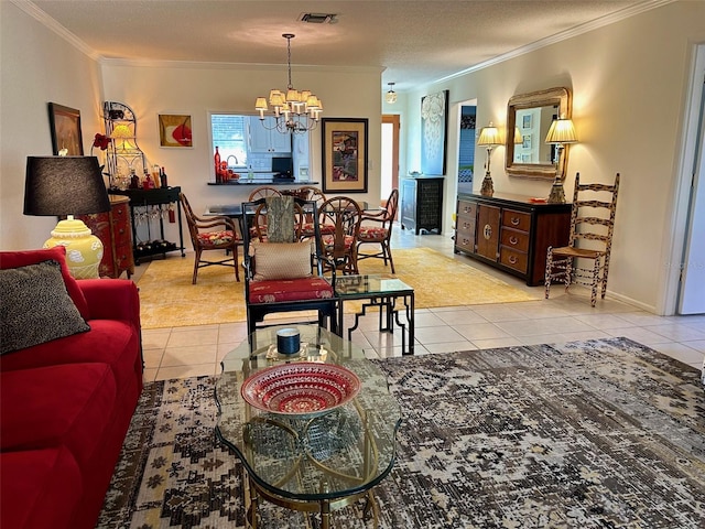 living room with an inviting chandelier, ornamental molding, light tile patterned floors, and a textured ceiling