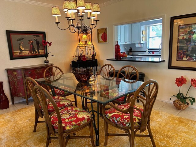 tiled dining space with an inviting chandelier and crown molding