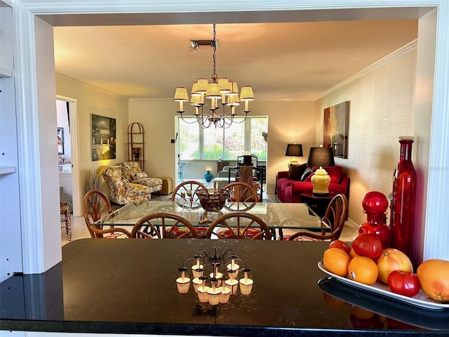 dining room with crown molding and a chandelier