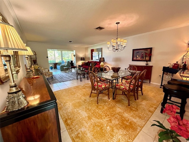 tiled dining space featuring a notable chandelier and ornamental molding