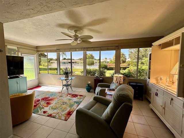 sunroom / solarium with ceiling fan