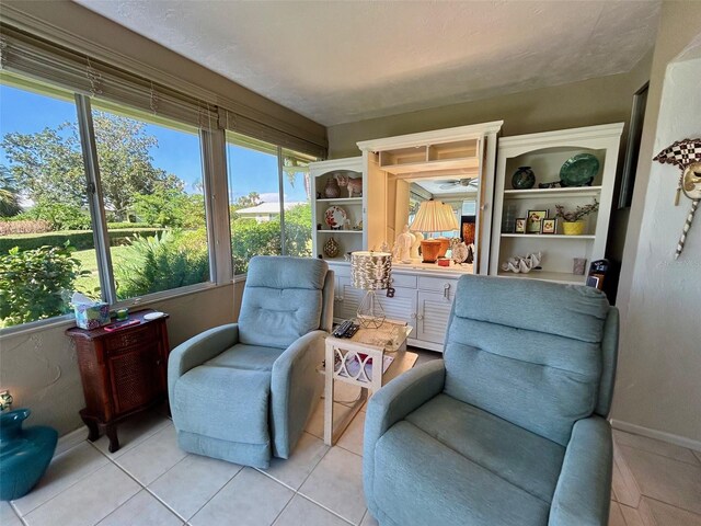 sitting room featuring light tile patterned flooring