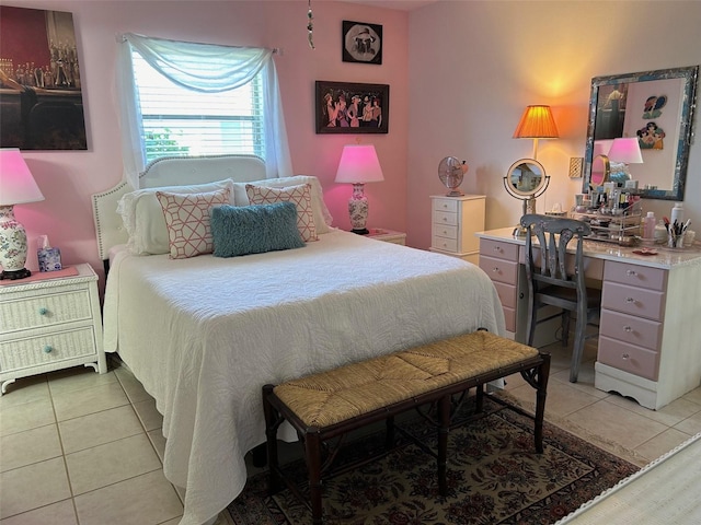 bedroom with light tile patterned floors