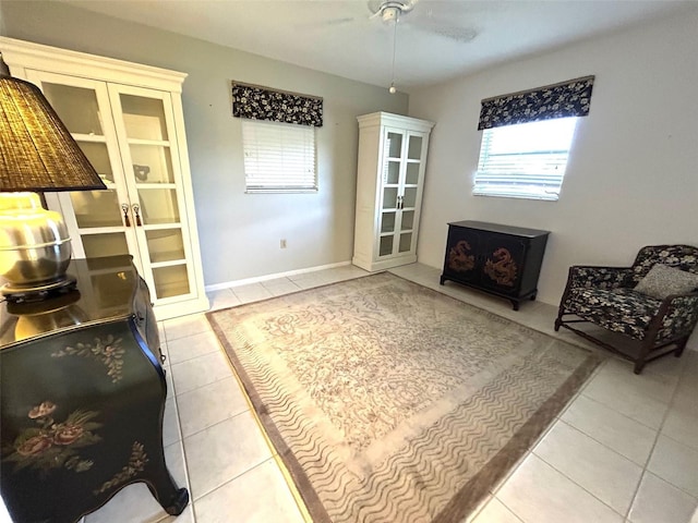 6812 11th Ave W Unit 6812, Bradenton, FL 34209 - sitting room featuring a ceiling fan and light tile patterned flooring