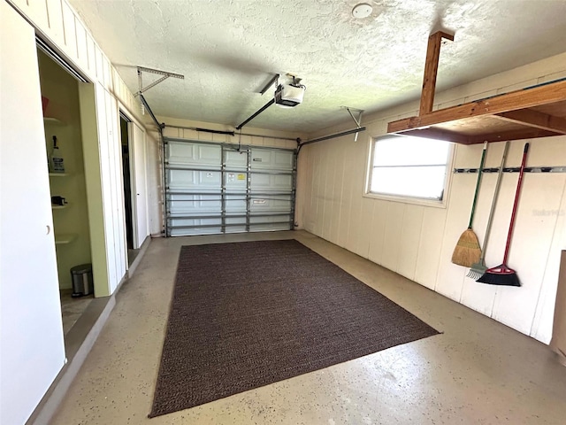6812 11th Ave W Unit 6812, Bradenton, FL 34209 - garage featuring a garage door opener