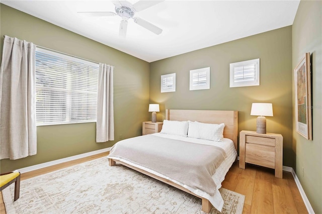 bedroom featuring ceiling fan and light wood-type flooring