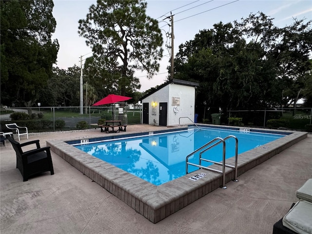 view of pool featuring a patio