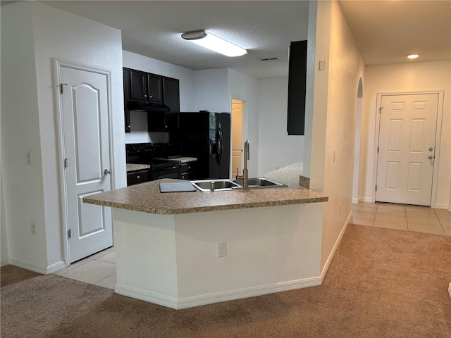 kitchen with black appliances, kitchen peninsula, sink, and light colored carpet