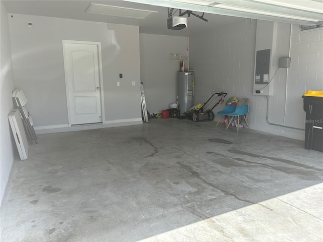 garage with a garage door opener, electric panel, and electric water heater