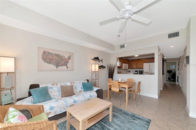 553 Bahia Beach Blvd, Ruskin, FL 33570 - tiled living room featuring ceiling fan