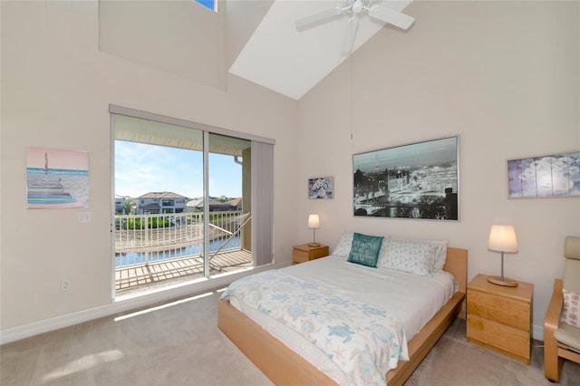 553 Bahia Beach Blvd, Ruskin, FL 33570 - carpeted bedroom with ceiling fan, high vaulted ceiling, and access to exterior