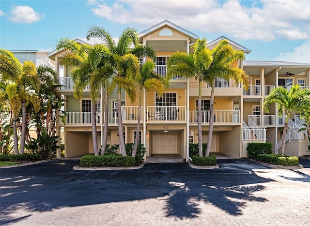 553 Bahia Beach Blvd, Ruskin, FL 33570 - view of building exterior featuring a garage