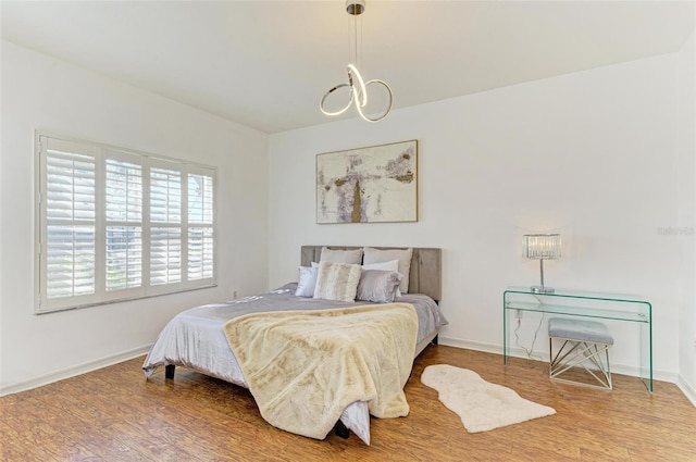 bedroom featuring hardwood / wood-style flooring