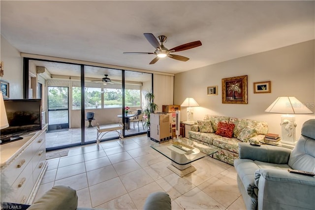 living room with a wall of windows and ceiling fan