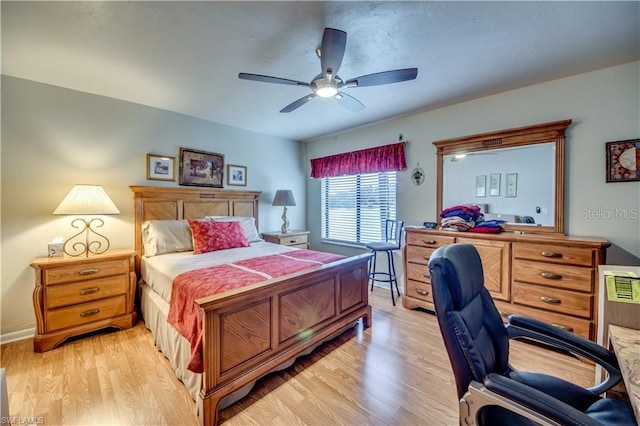 bedroom featuring light wood-type flooring and ceiling fan