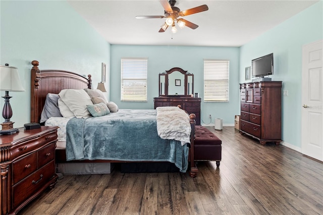 bedroom featuring ceiling fan and dark hardwood / wood-style flooring