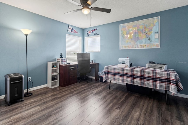 bedroom featuring a textured ceiling, dark hardwood / wood-style floors, and ceiling fan