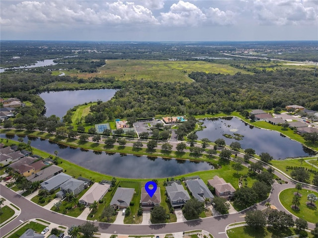 drone / aerial view with a water view