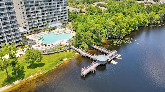 birds eye view of property with a water view