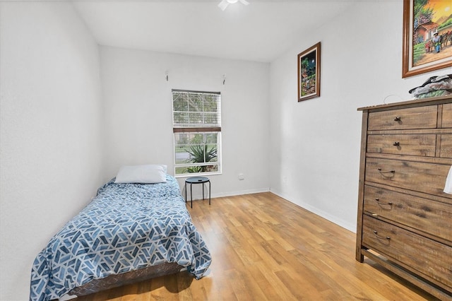 bedroom featuring wood-type flooring