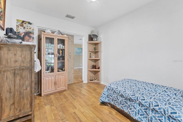 bedroom with light wood-type flooring