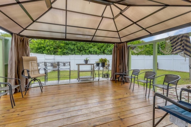 wooden deck featuring a gazebo