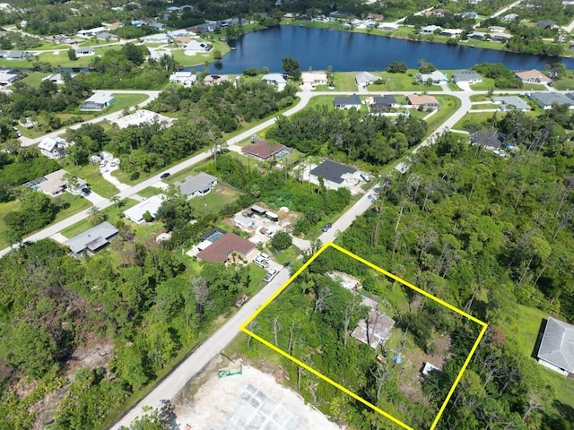 bird's eye view with a water view and a residential view