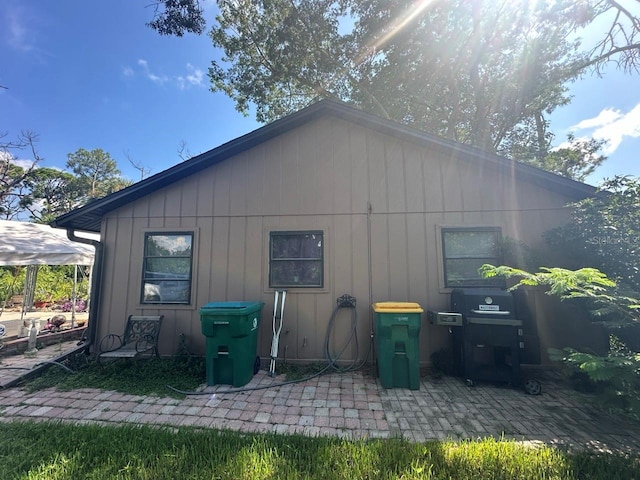 rear view of house featuring a patio area