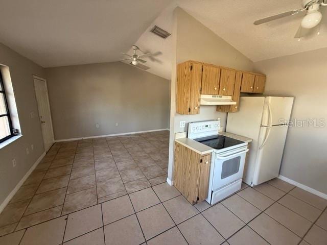 kitchen featuring ceiling fan, under cabinet range hood, white appliances, vaulted ceiling, and light countertops