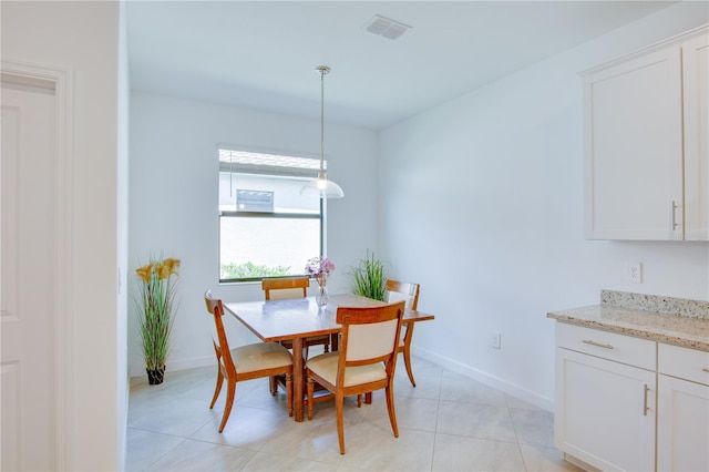 view of tiled dining area