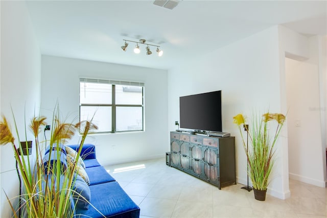 living room with light tile patterned flooring