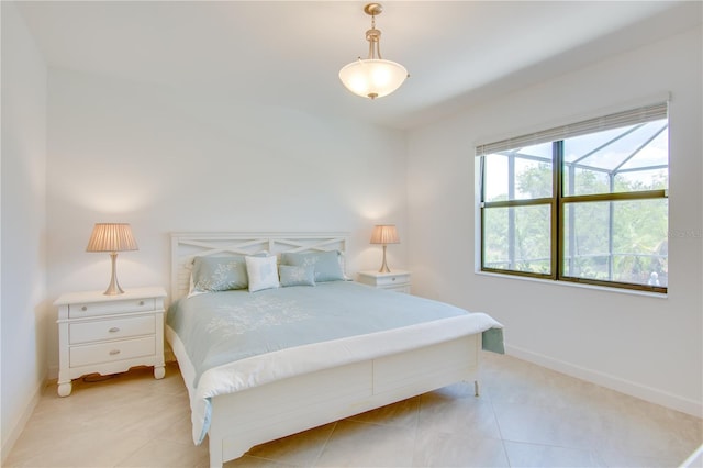 bedroom featuring light tile patterned floors