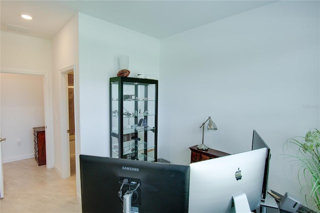 home office featuring light tile patterned flooring