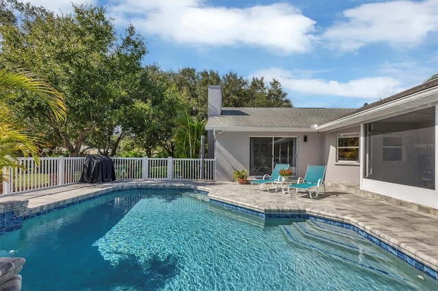 view of swimming pool featuring a patio