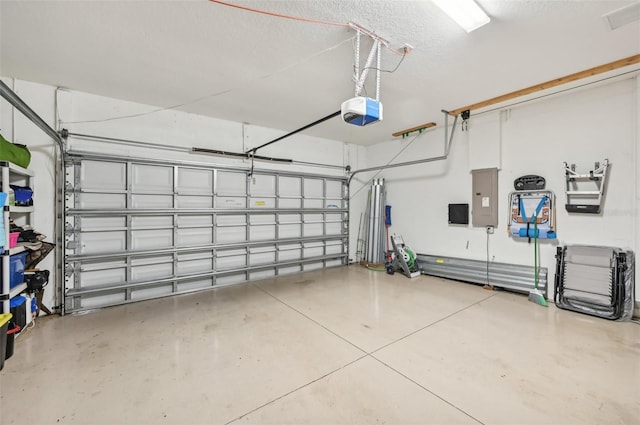 garage featuring electric panel and a garage door opener