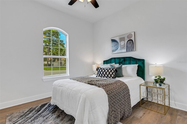 bedroom featuring wood-type flooring and ceiling fan