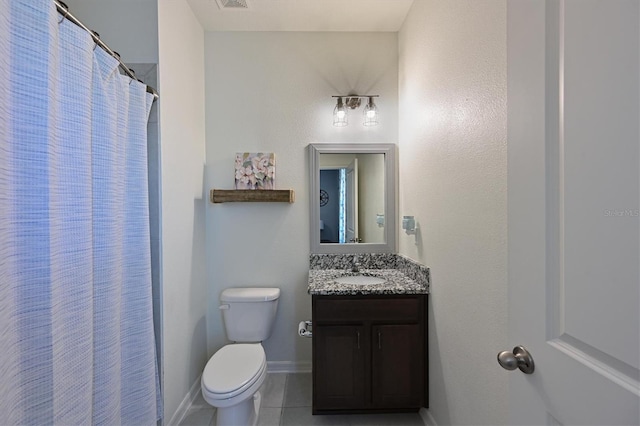 bathroom featuring vanity, baseboards, toilet, tile patterned flooring, and visible vents