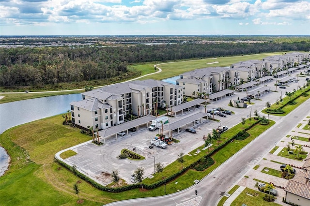 birds eye view of property featuring a water view