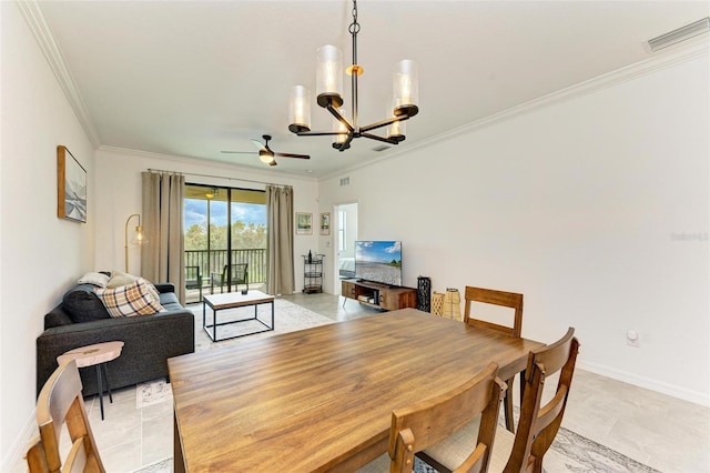 dining area featuring ceiling fan with notable chandelier and ornamental molding