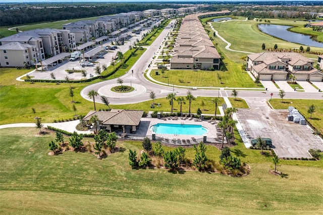 birds eye view of property featuring a water view