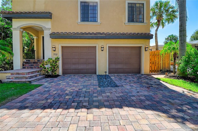 view of front of property featuring a garage