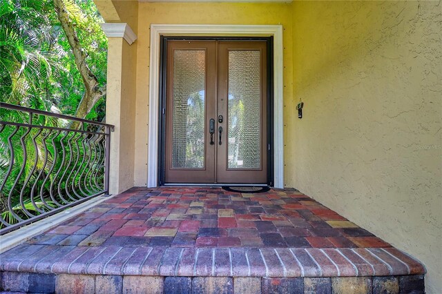 view of exterior entry with french doors