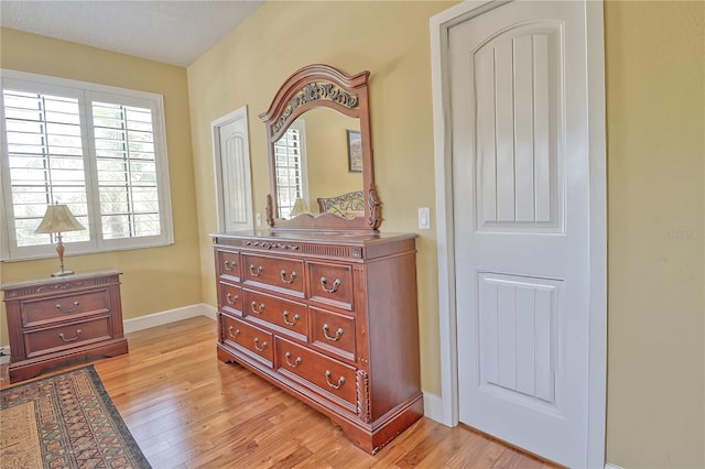 bedroom with light hardwood / wood-style flooring