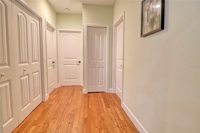 hallway featuring light wood-type flooring